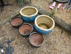 Two large blue glazed garden pots and three others