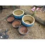 Two large blue glazed garden pots and three others