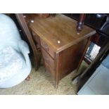 A mahogany desk on splay feet