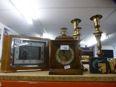 Two pairs of brass candlesticks, two mantel clocks and sundry items