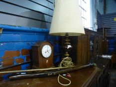 An Edwardian mantle clock, a walking stick having fish handle and sundry