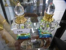 two scent bottles