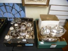 Two tray s of silver plated items including cutlery and teasets.