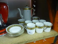 A china coffee set for six having floral gilt rim