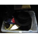 Vintage suitcase containing various hats incl. 1920s bird feather half hat by Edward French, 1950s c