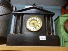 A Victorian black slate mantel clock and one other