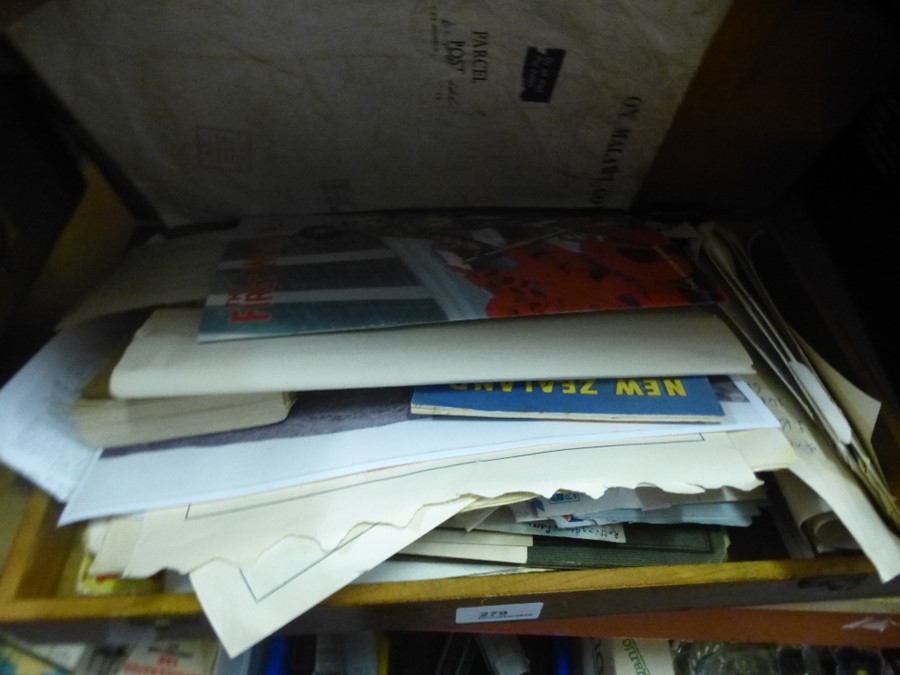 A small box of postcards and ephemera