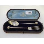 A Victorian silver spoon and fork set with ball handled end, of good condition hallmarked Sheffield