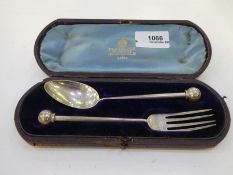 A Victorian silver spoon and fork set with ball handled end, of good condition hallmarked Sheffield