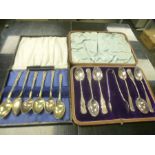 A set of Victorian decorative cased silver teaspoons with sugar tongs included, stamped Sheffield 18