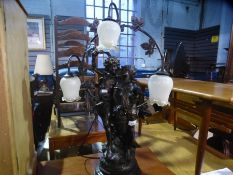 A Bronze style figural table lamp