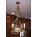Brass 5 light chandelier with center shade.