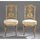 2 Louis XVI style, gilt chairs.