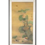 Chinese scroll painting of a lotus flower.