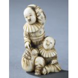 Netsuke of two boys and Daruma doll, 19th c.