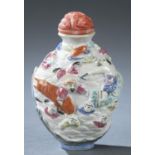 Molded porcelain snuff bottle, Qianlong mark.