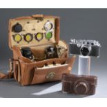 Leica IIIc Camera, case, and accessories.