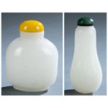 2 White glass snuff bottles.