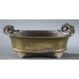 Chinese brass oval censer with chilong handles.