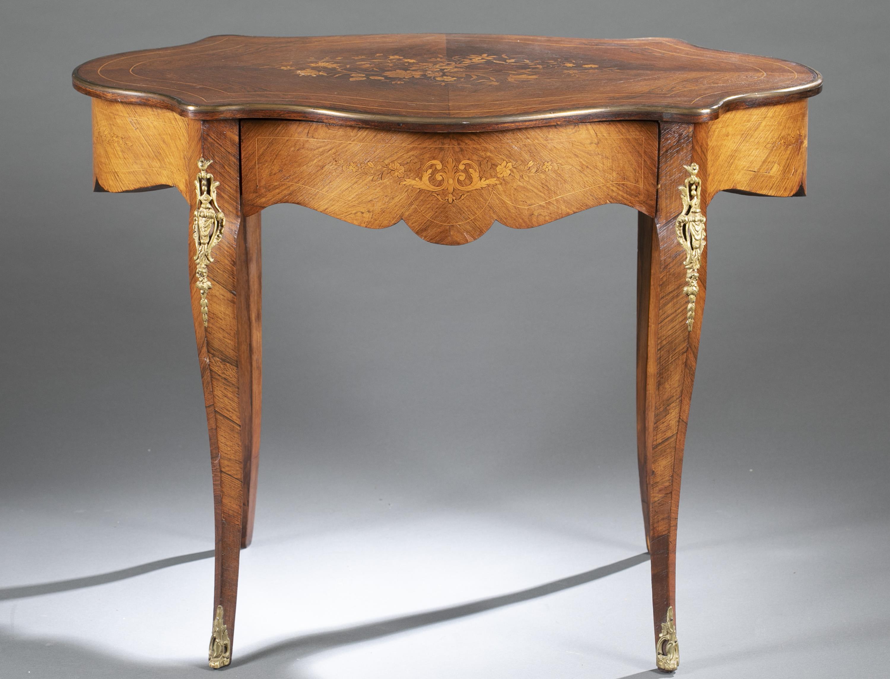 Louis XV style marquetry table, 19th century.