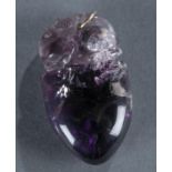 Carved Chinese amethyst pendant.