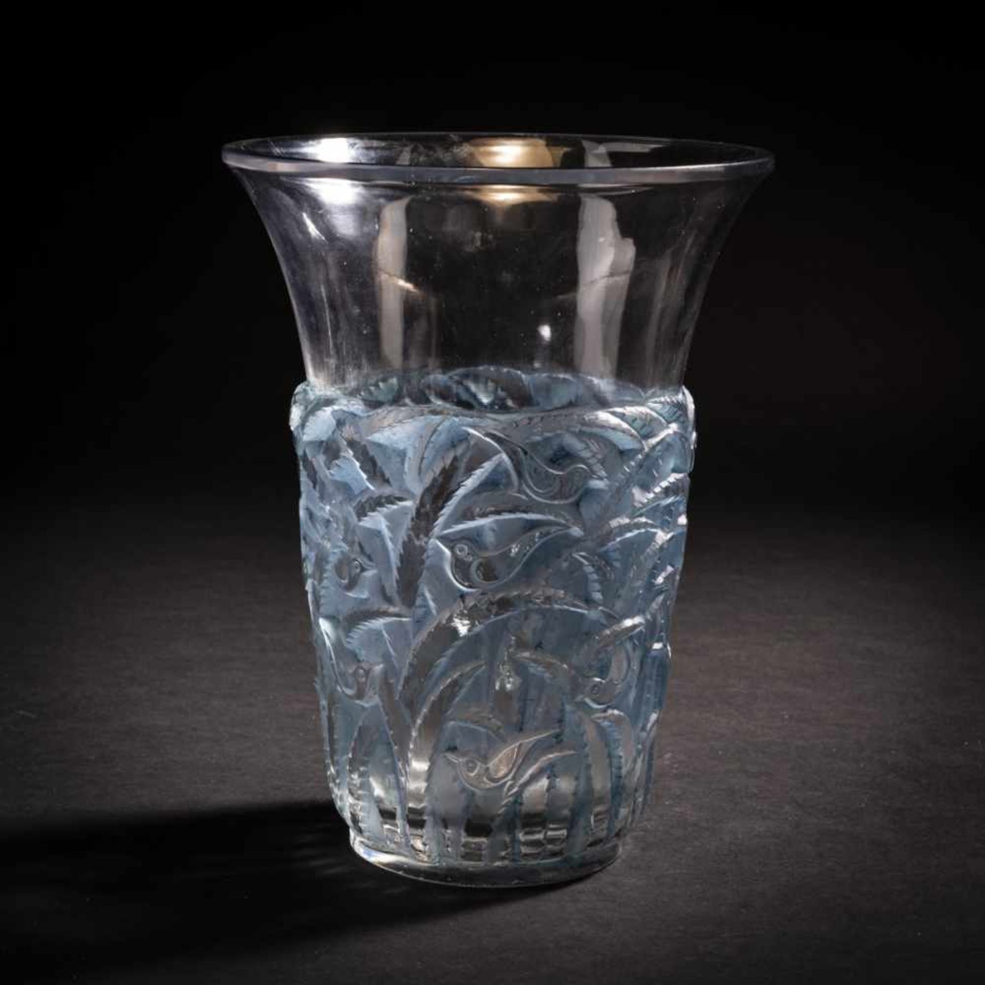 René Lalique, 'Borneo' vase, 1930'Borneo' vase, 1930H. 24 cm. Clear, moulded glass, blue patina,