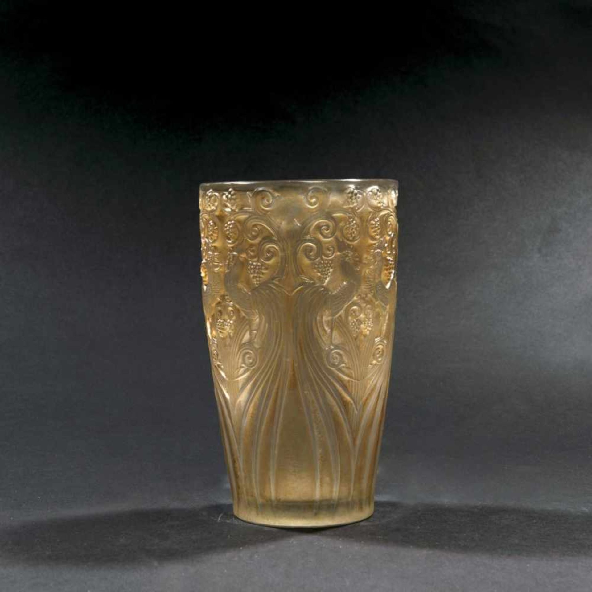 René Lalique, 'Coqs et Raisins' vase, 1928'Coqs et Raisins' vase, 1928H. 15.5 cm. Clear, moulded