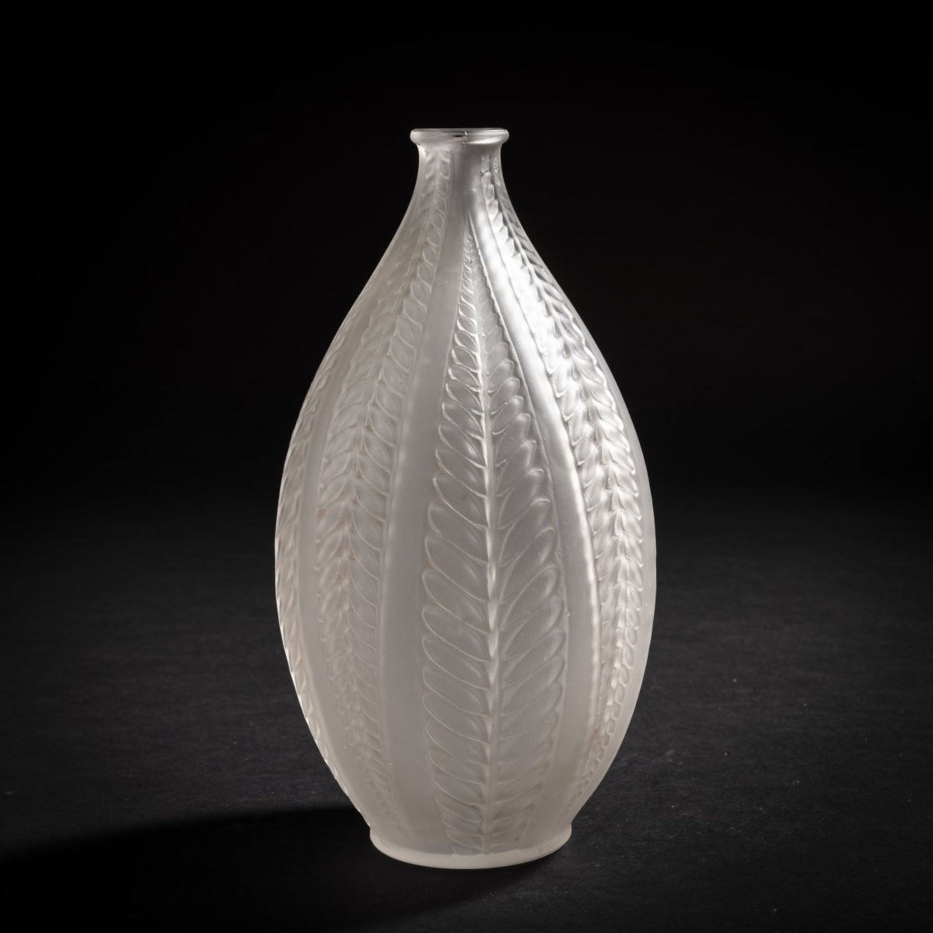 René Lalique, 'Acacia' vase, 1921'Acacia' vase, 1921H. 20.5 cm. Clear, moulded glass, satined. All-