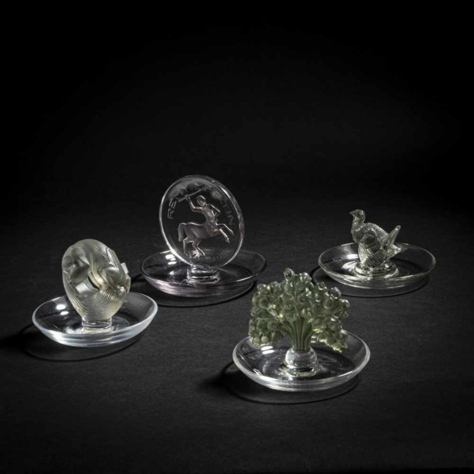 René Lalique; Marc Lalique, Four Ashtrays 'Dindon', 1925, 'Alaska', 1931, 'Muget', 1931, 'Remy