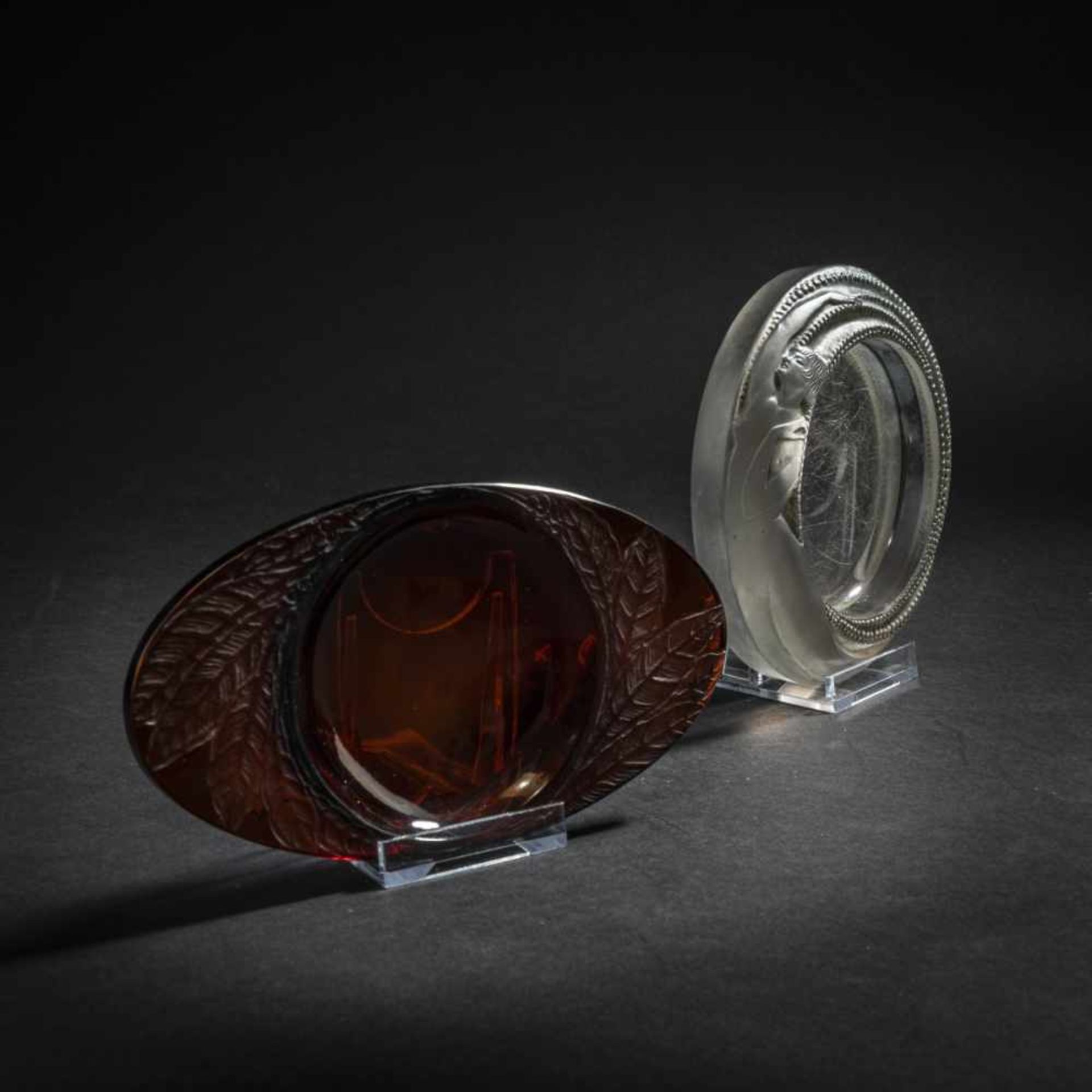 René Lalique, Two ashtrays 'Anthéor', 1927 and 'Feuilles', 1924Two ashtrays 'Anthéor', 1927 and '