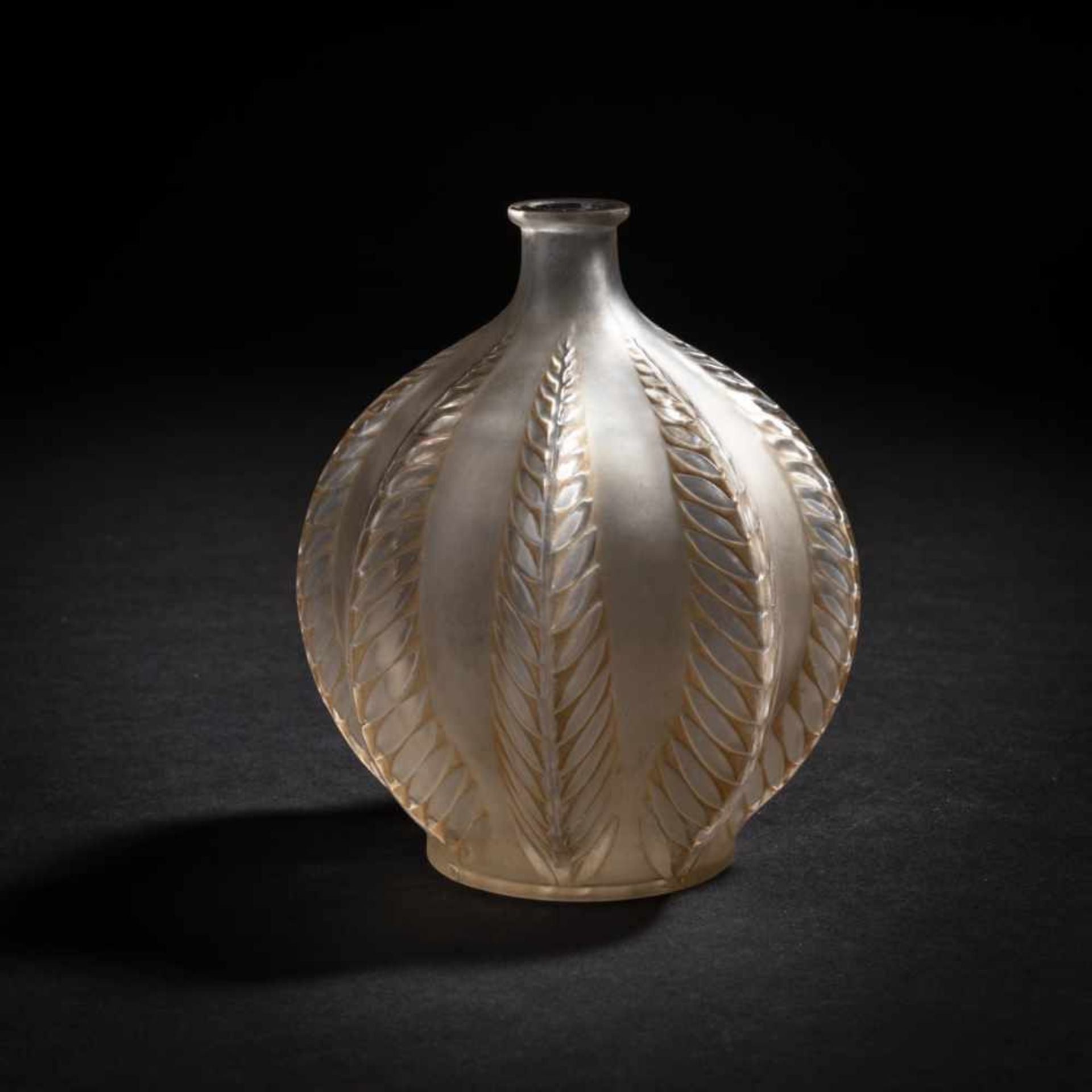 René Lalique, 'Malines' vase, 1924'Malines' vase, 1924H. 12.5 cm. Clear, mould-blown glass, brown