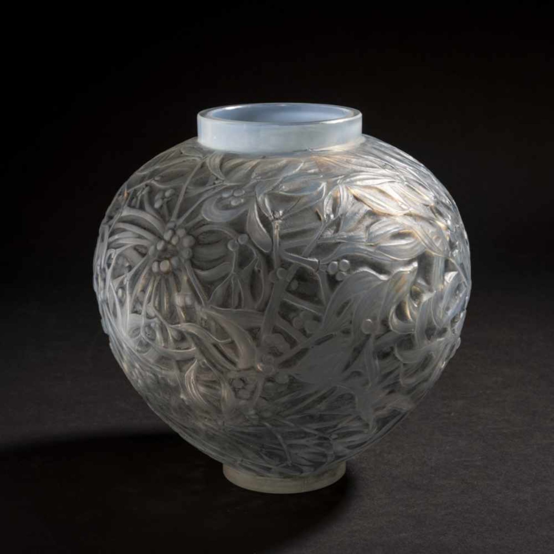 René Lalique, 'Gui' vase, 1920'Gui' vase, 1920H. 17 cm. Clear, mould-blown glass, opalescent,