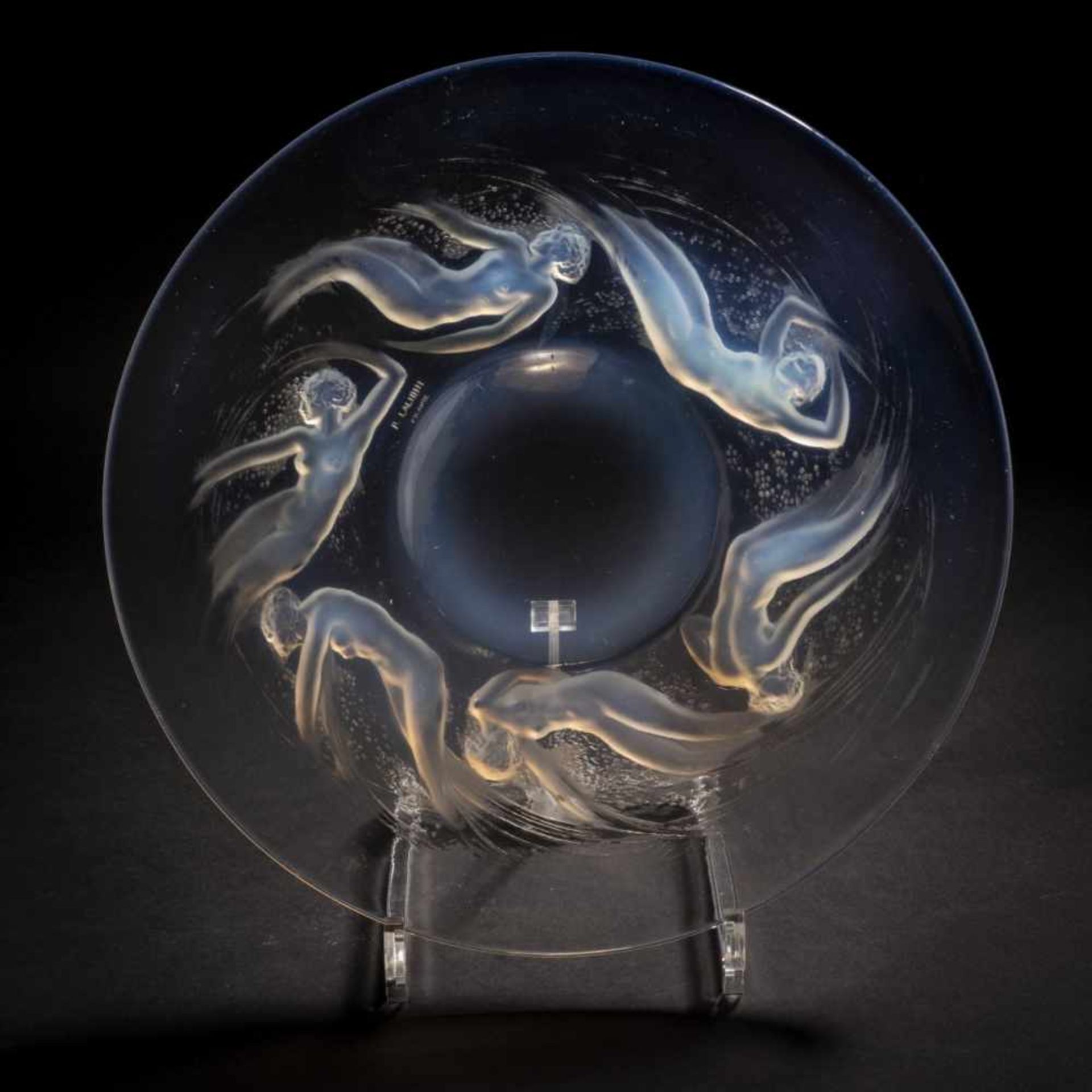 René Lalique, 'Ondines' plate, 1921'Ondines' plate, 1921D. 27.5 cm. Clear, moulded glass, opalescent