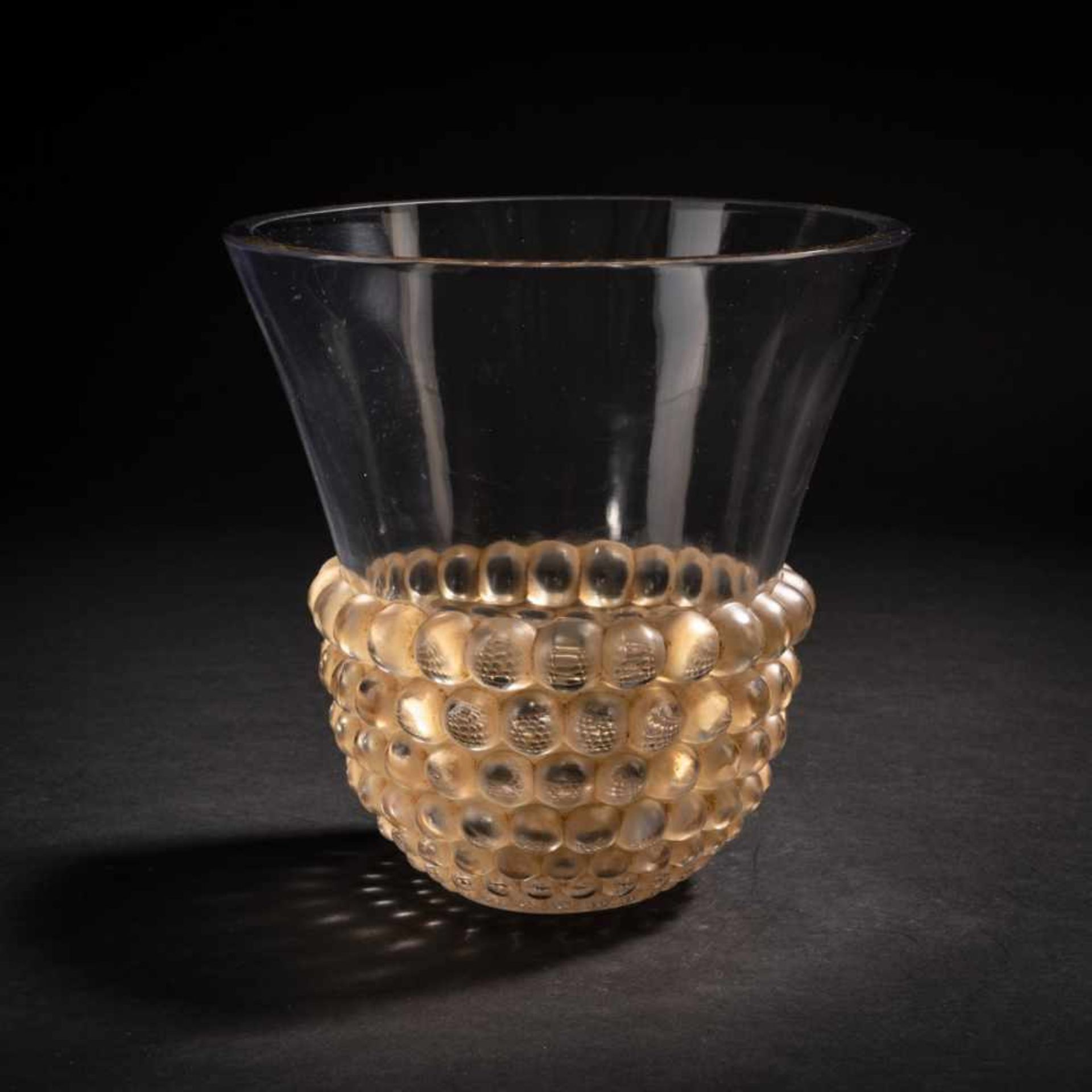 René Lalique, Vase 'Seeds', 1930Vase 'Seeds', 1930H. 19.4 cm. Clear, moulded glass, the 'seeds'