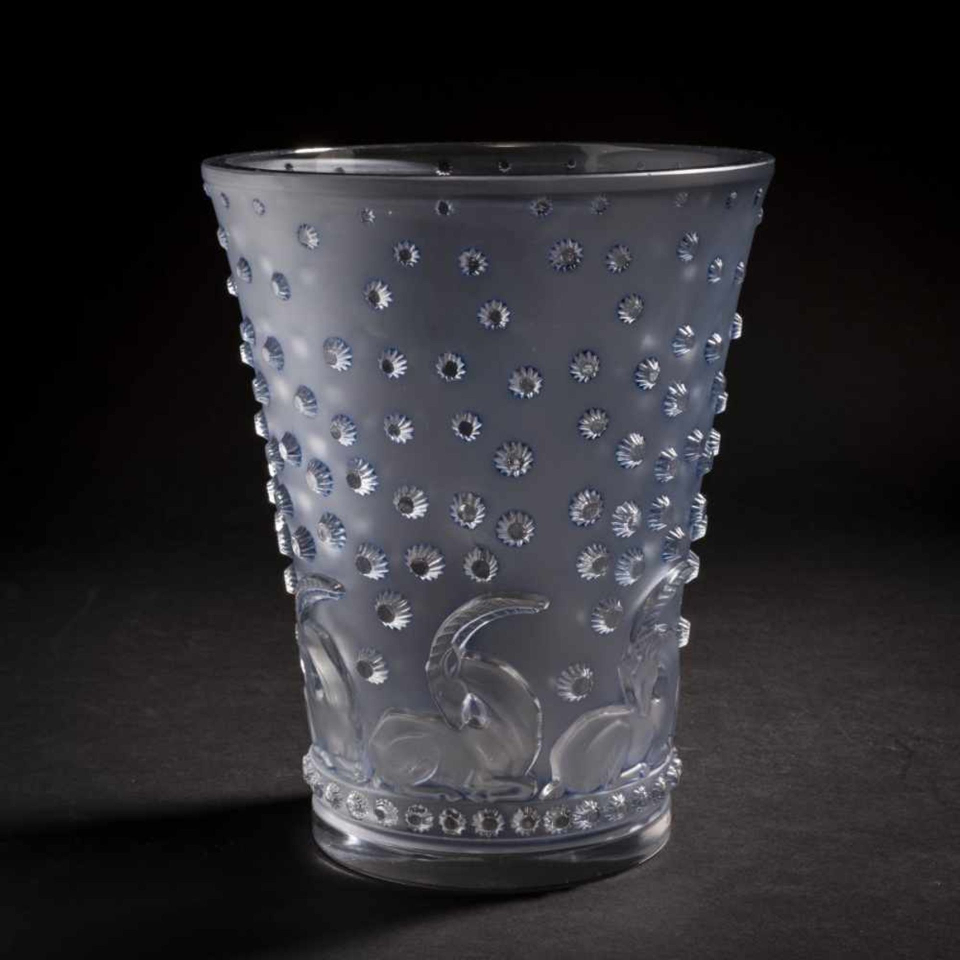 René Lalique, Vase 'Ajaccio', 1938Vase 'Ajaccio', 1938H. 20 cm. Clear, moulded glass, partially