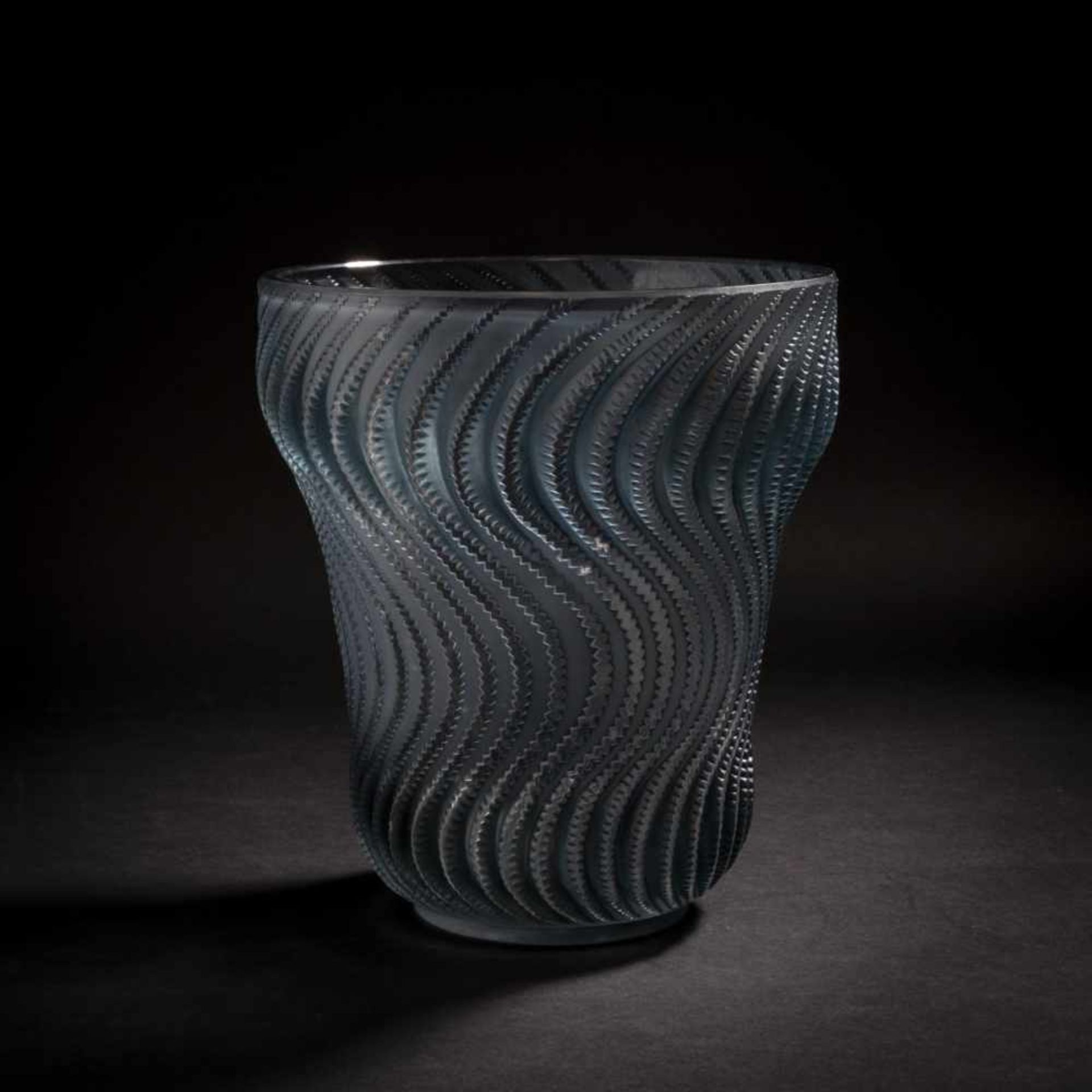 René Lalique, 'Actinia' vase, 1934'Actinia' vase, 1934H. 22 cm. Clear moulded glass, partially