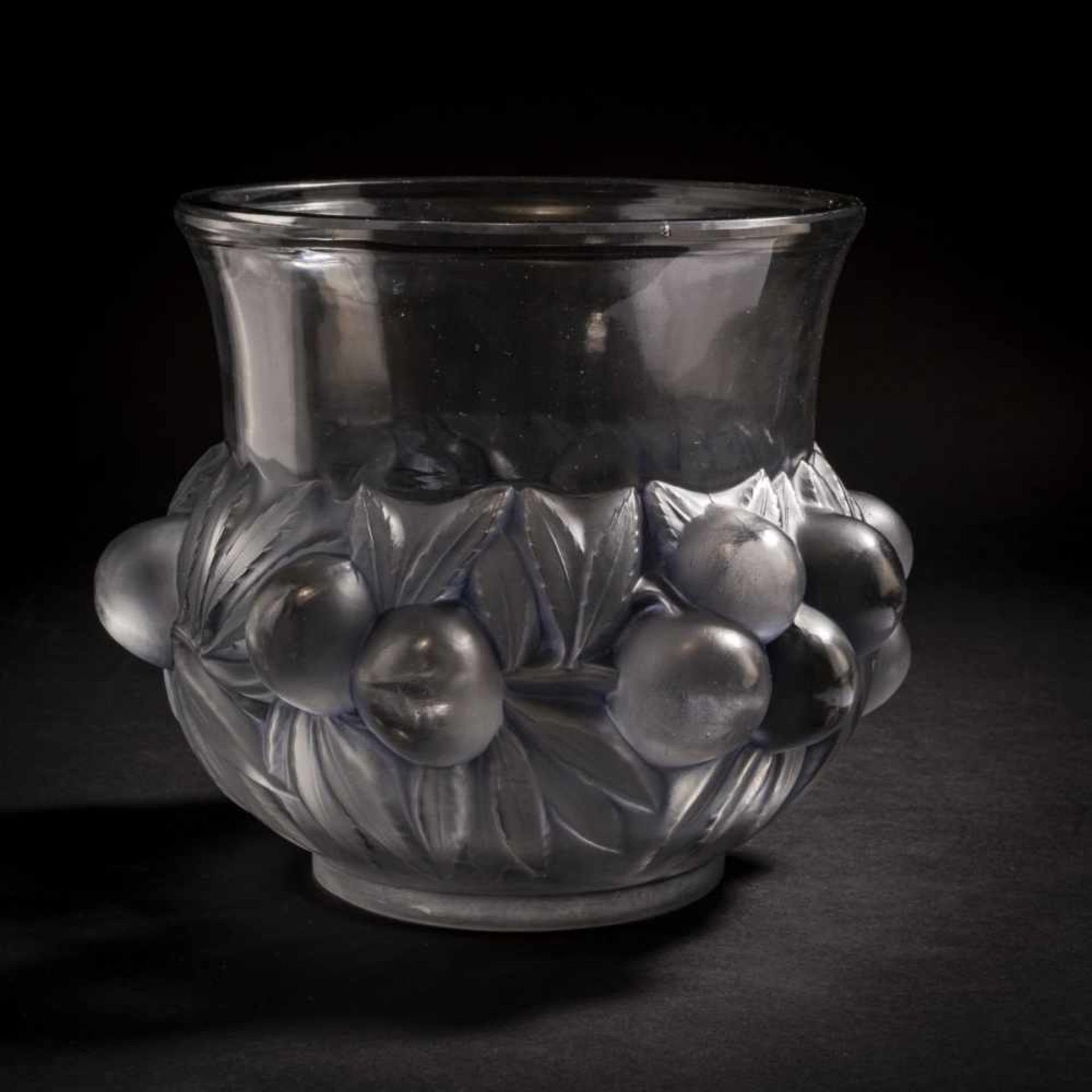 René Lalique, 'Prunes' vase, 1930'Prunes' vase, 1930H. 18 cm. Clear, moulded glass, partially