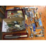 Miscellaneous cutlery and kitchen utensils including enamelled collectors teaspoons, knives,