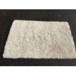 An Indian made Laura Ashley wool & cotton tufted Frankie rug. (72in x 49in)