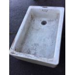 A large stoneware belfast sink with integral overflow. (30in x 30.5in x 10in)