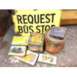 An enamelled Request Bus Stop sign; and seven miscellaneous tins - sweets, tobacco, commemorative,