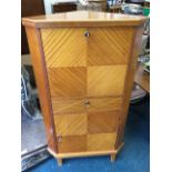 A 60s vintage mahogany corner bureau, with quarter veneered doors and boxwood strung drawer,