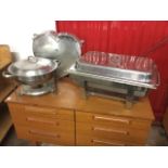 Two stainless steel food cooking/warming/dispensing pans on stands with liners - one rectangular &