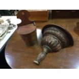 A continental salt box of barrel form with arched wall mount and hinged lid; and a leaf carved