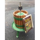 A cider press on stand with oak barrel type staves, complete with instruction book. (A lot)