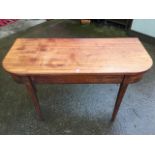 A nineteenth century mahogany 'D' shaped table, formerly the end of a dining table, the rounded