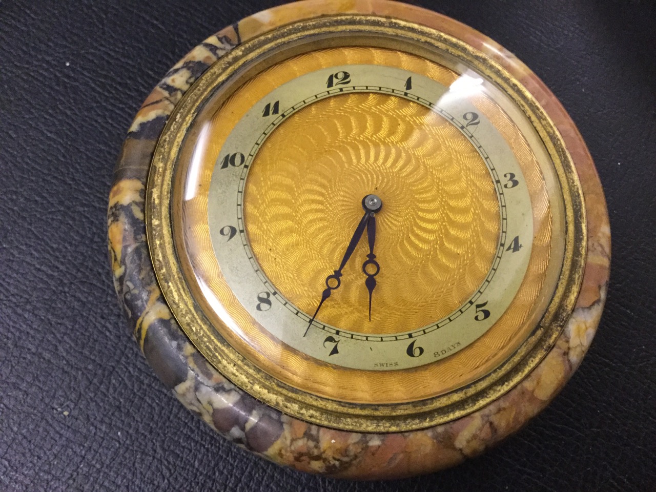 A Swiss made 1930s eight-day table clock, the circular moulded marble case on four feet mounted with - Image 2 of 3