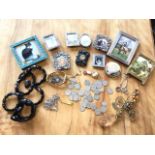 Miscellaneous photo frames, coins, jewellery, some jet, a Seiko ladies watch, a compact, a