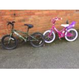 A Raleigh pink toddlers bicycle with dolly seat; and an army style childs bike. (2)