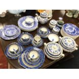 A collection of blue & white ceramics including Spode, Wedgwood, Royal Doulton, willow pattern, a